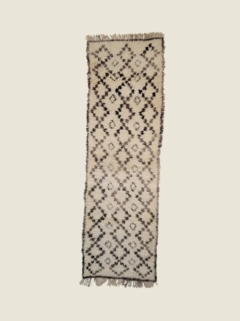 Authentic Beni Ourain vintage runner 88×290cm, handwoven black and ivory wool rug with geometric diamond motifs.