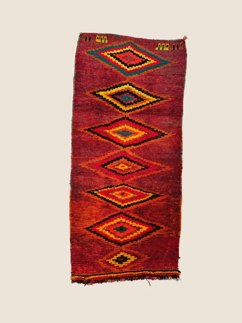 Vintage Beni M'guild rug 116×240cm, handwoven wool with deep teal and vivid red diamond patterns.