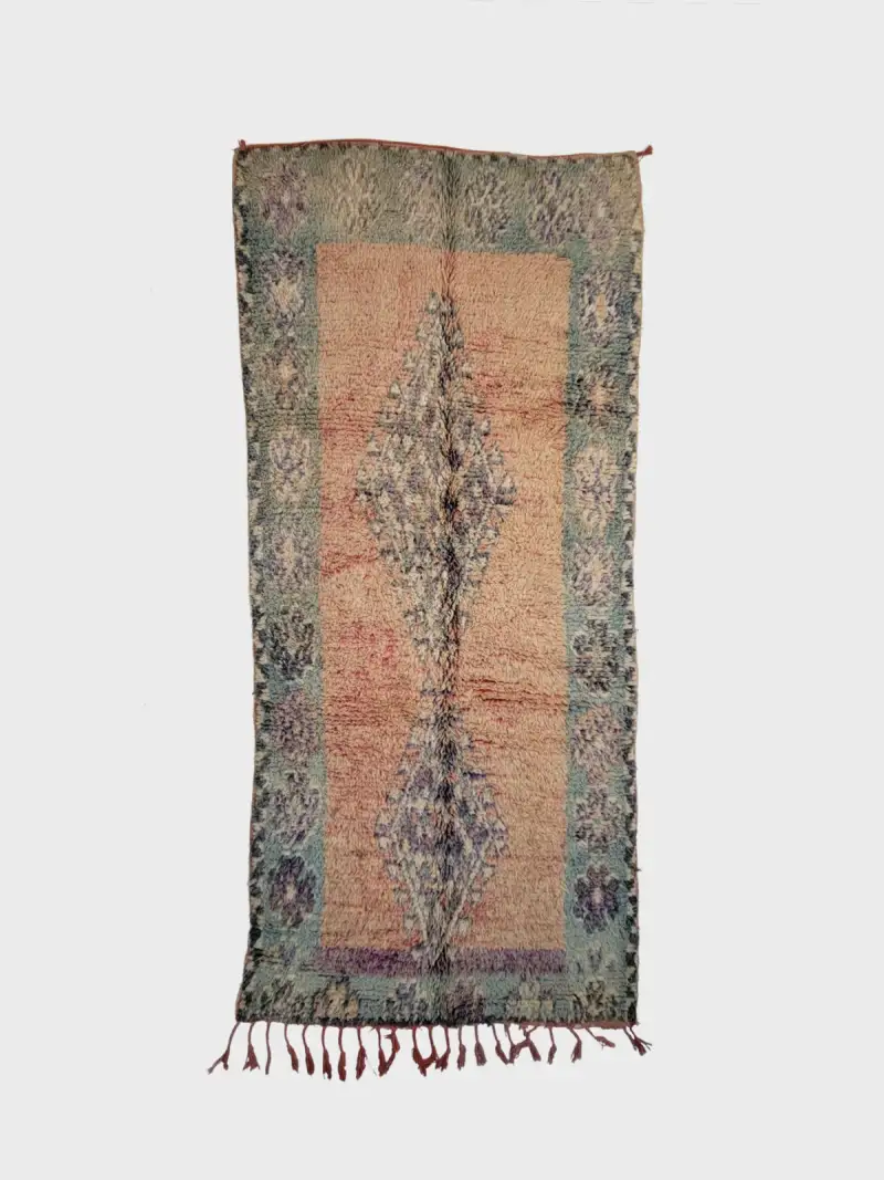 Vintage Beni M'guild rug 134×300cm, handwoven berber rug in serene beige and mauve geometric patterns.