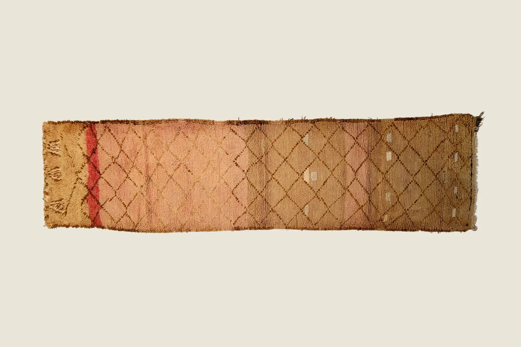 Azilal rug terracotta weave detail showing hand-spun wool texture and traditional craftsmanship