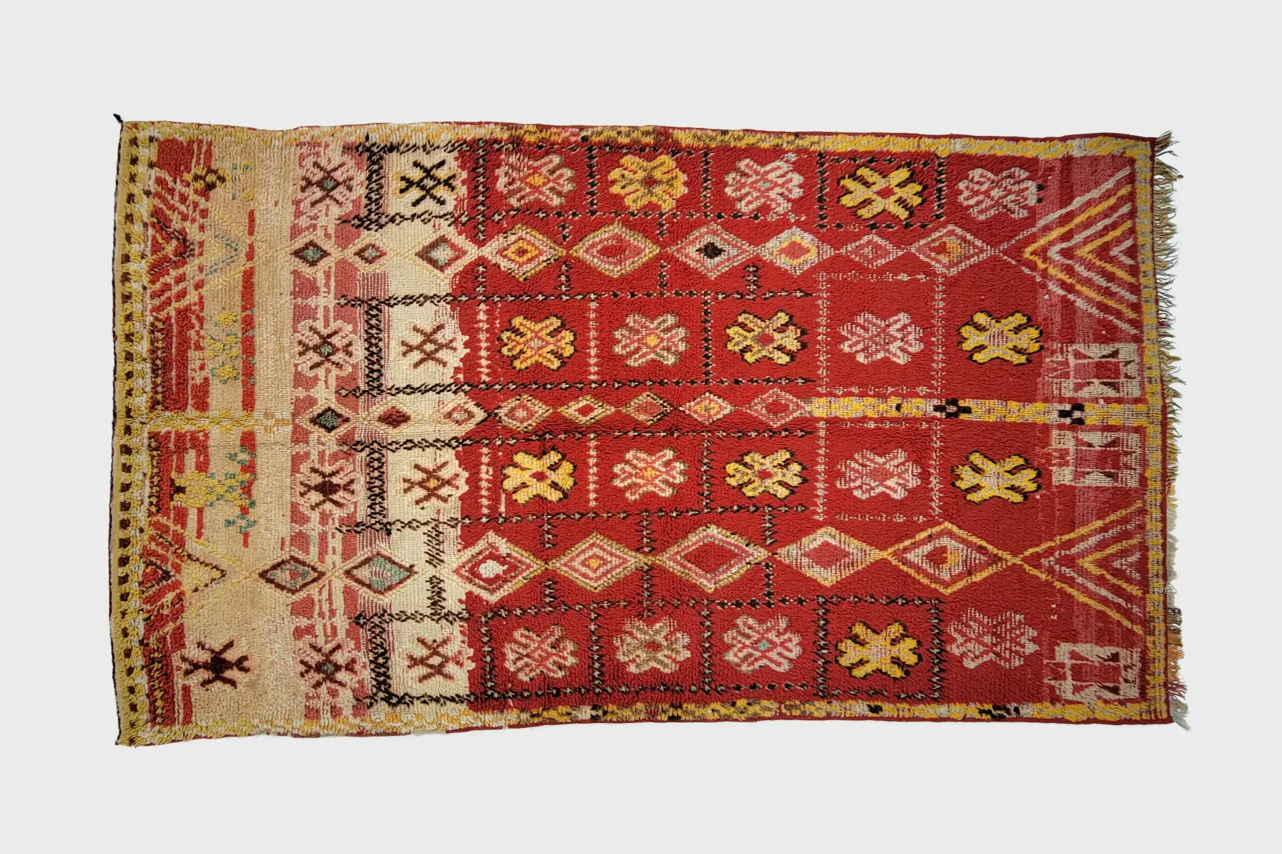 Beni M'Guild hand-knotted texture detail showing terracotta wool and geometric pattern craftsmanship