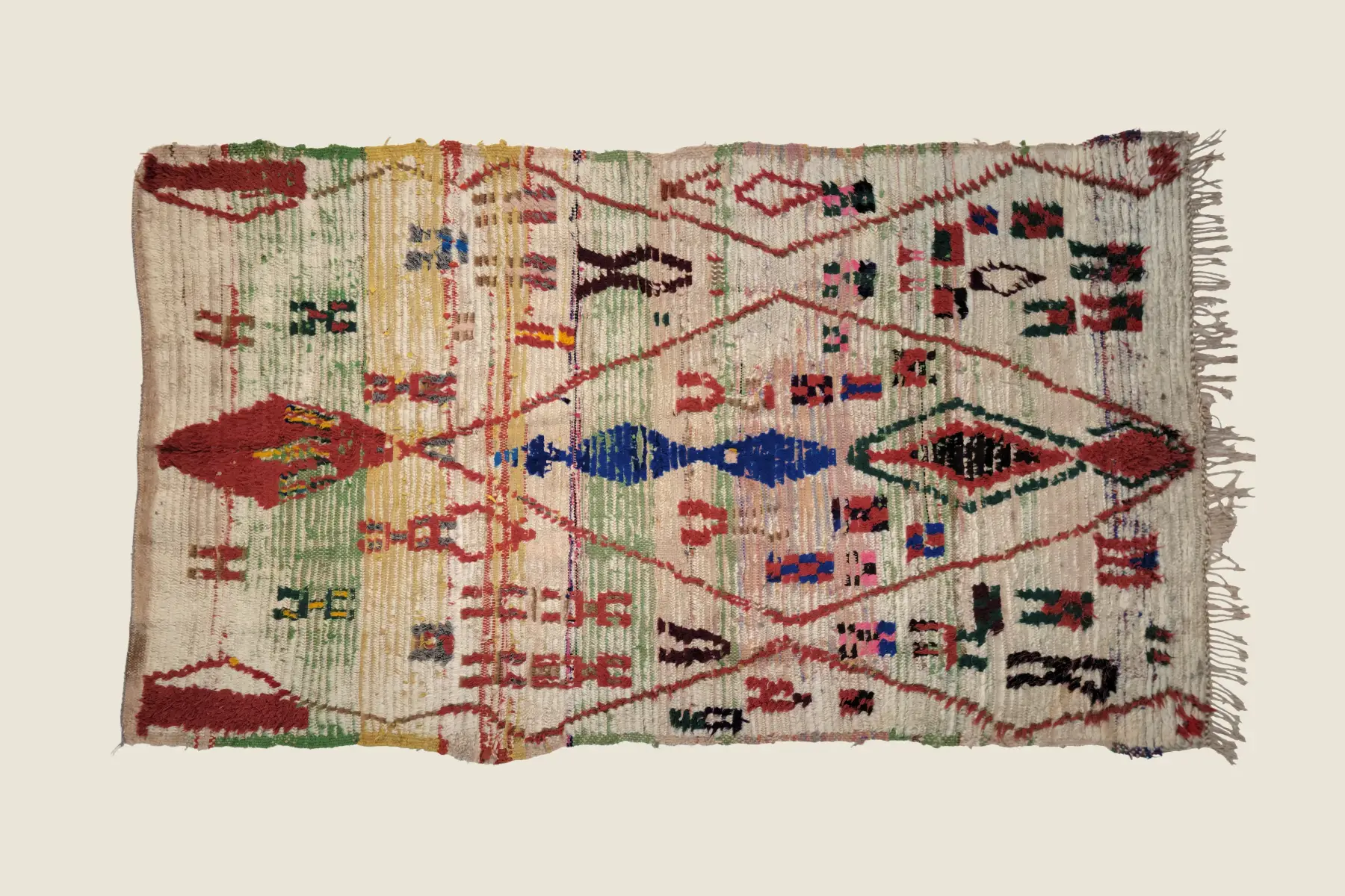 Azilal rug texture detail showing hand-spun wool knots and deep azure tribal weaving craftsmanship