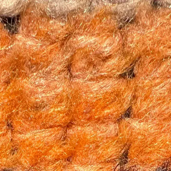A color swatch labeled Warm Orange from the Atlas product line, showing a bright, warm orange hue.