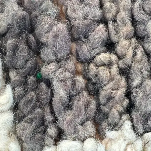 A color swatch labeled Warm Grayish Beige, a soft neutral gray-beige from the gray family, featured in the