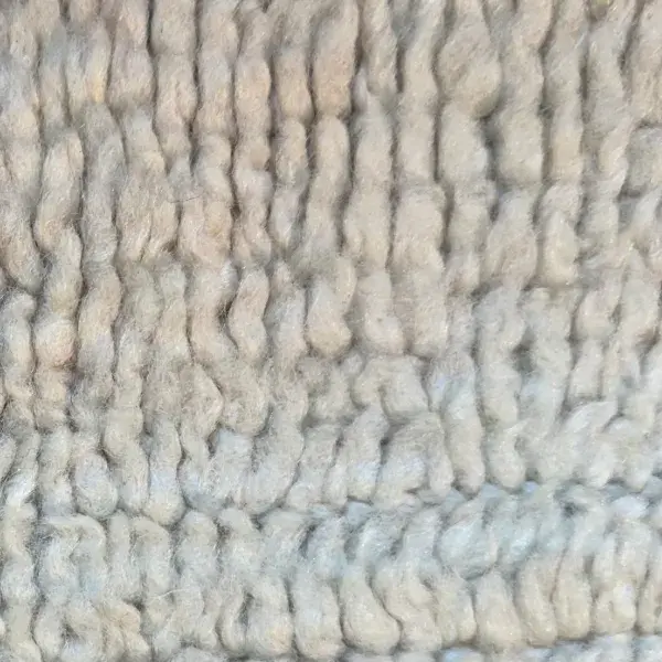 Light warm gray symbol with a yellow undertone