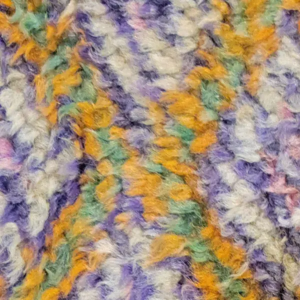 Azilal zigzag style rug in a vibrant orange with an RGB value of 235, 175, 38.