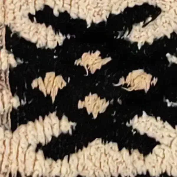 Charcoal gray color swatch from a Moroccan rug.