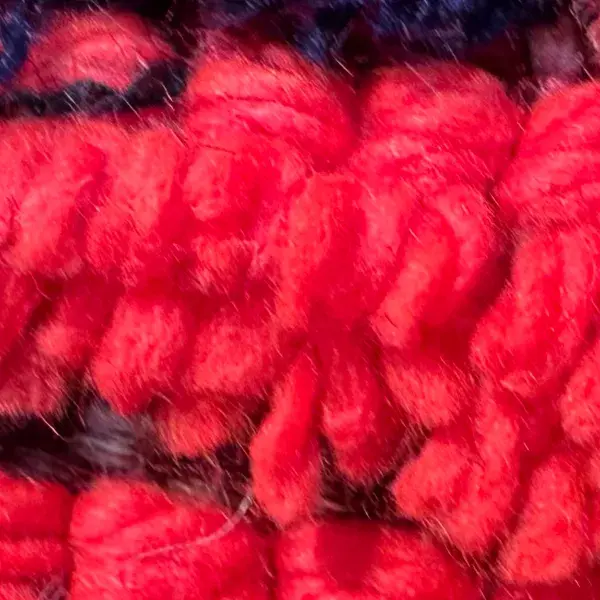 A vivid red diamond symbol.