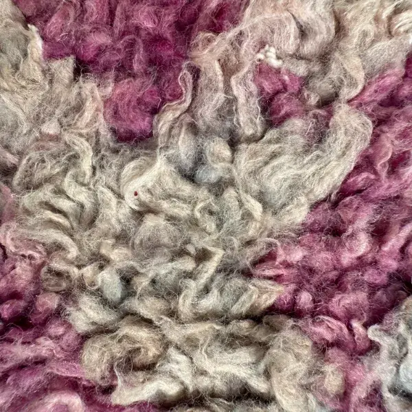 Geometric art rug in a pale orange-beige