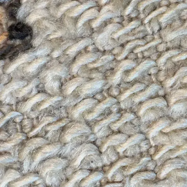 Light gray star symbols on a warm gray background