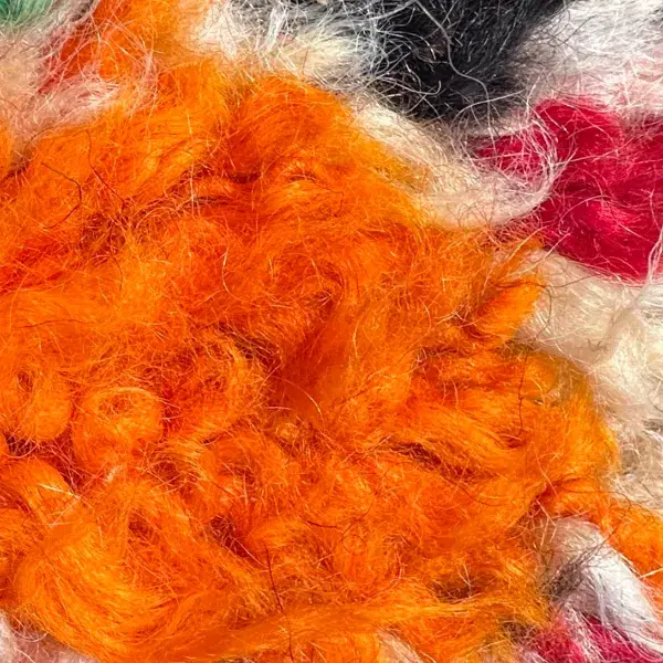 Diamond symbol in a vibrant orange-red color, hex code e66128.