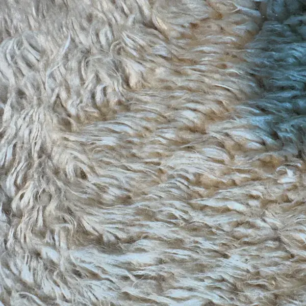 A simple zigzag pattern in a light blue-gray color.