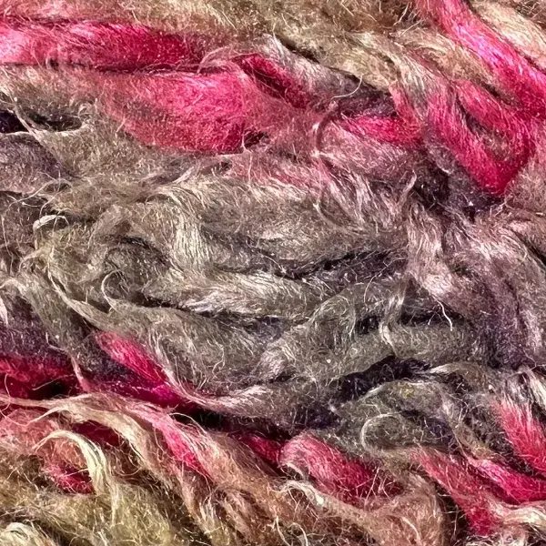 A color swatch labeled Warm Light Beige from the orange family, in the Boujad product line.