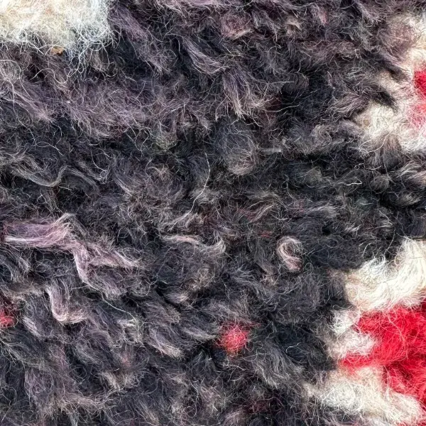 Dark warm gray color swatch from the Boujad collection, hex #312e32.