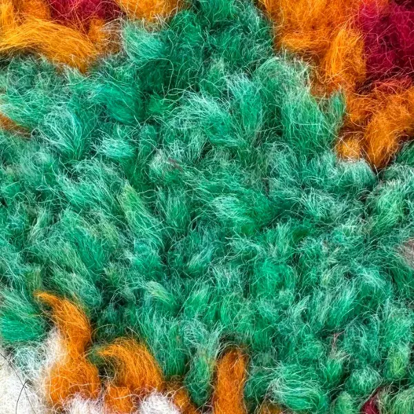 A color swatch labeled Medium Green from the Boujad product line, showing a muted, earthy green tone.
