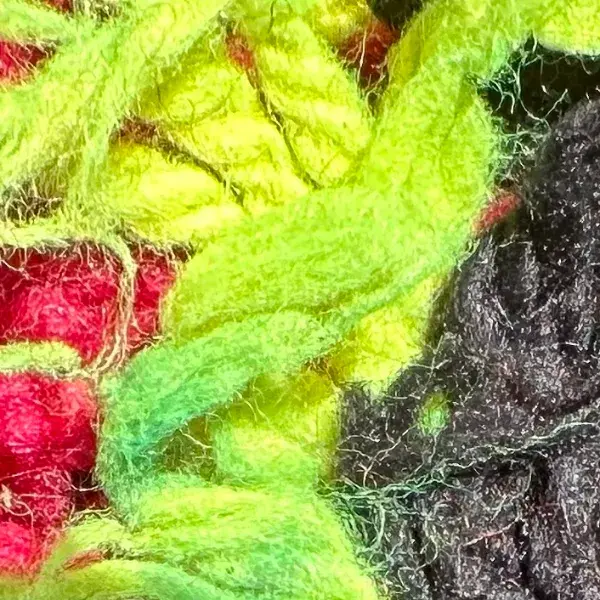 A bright green-yellow color swatch labeled talsint.
