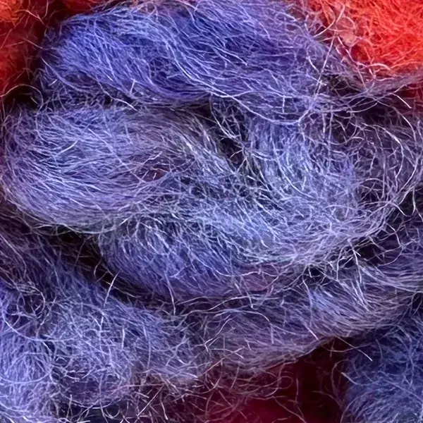 A medium violet-gray color swatch from the Talsint blue family.
