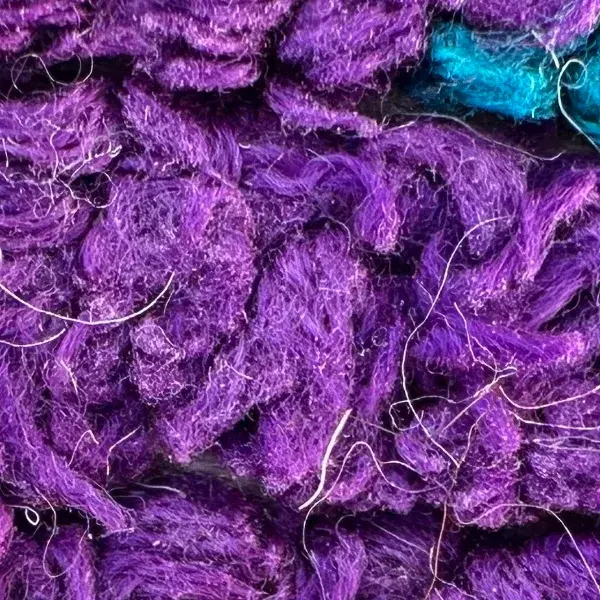 A color swatch labeled Medium Purple from the Atlas product line, showing a rich purple tone in the purple color family.