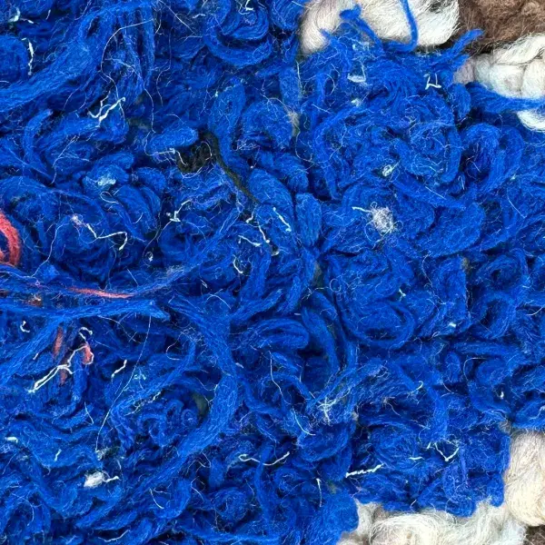 A solid medium blue color swatch representing the shade Medium Blue, with hex code #105dd2.
