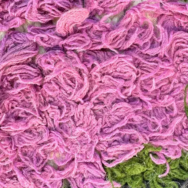 A color swatch labeled Warm Pink from the Atlas product line, showing a soft pink hue.