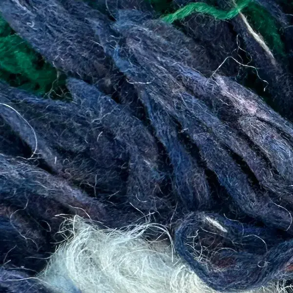 A color swatch of Dark Slate Blue, a deep blue-gray shade from the Handwoven Atlas Rug Slate Blue collection