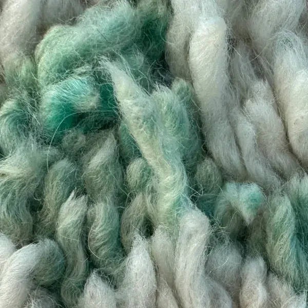 A color swatch in a muted sage green, labeled "Atlas" from the gray family.