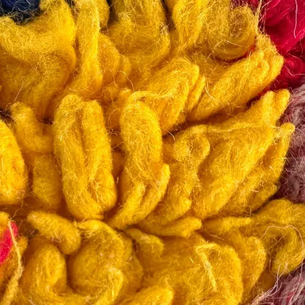 A warm golden yellow color swatch labeled Azilal, showing a rich orange-gold hue.