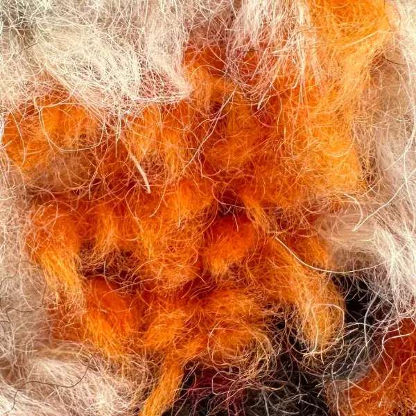 A color swatch labeled Warm Orange from the Marmoch product line, showing a vibrant orange hue.