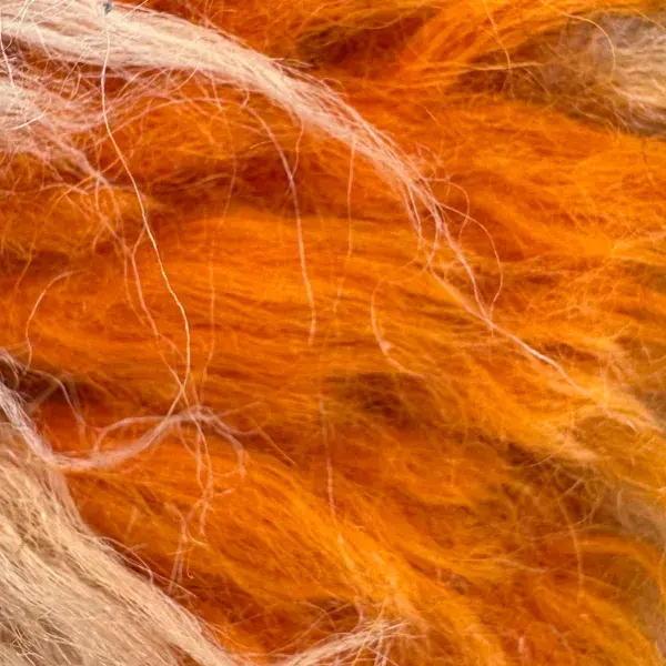 A color swatch labeled Warm Orange from the Marmoucha product line, showing a vibrant, earthy orange shade.