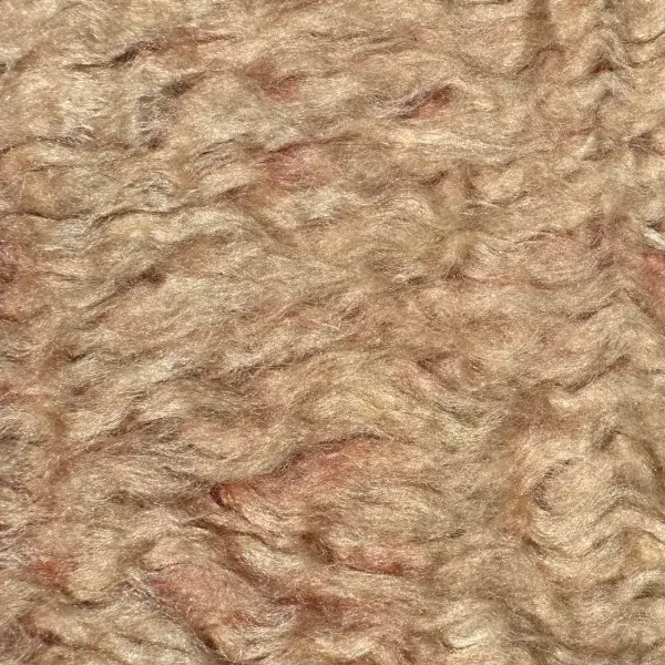 A color swatch labeled Warm Beige from the Atlas product line, showing a soft orange-beige tone.