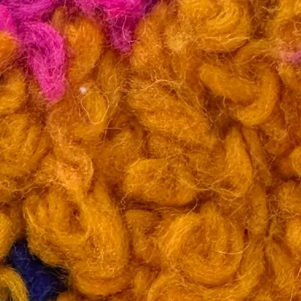 A warm medium orange-brown color swatch from the Talsint product line.