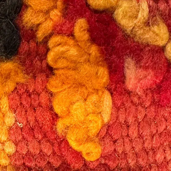 Vibrant orange zigzag symbol.