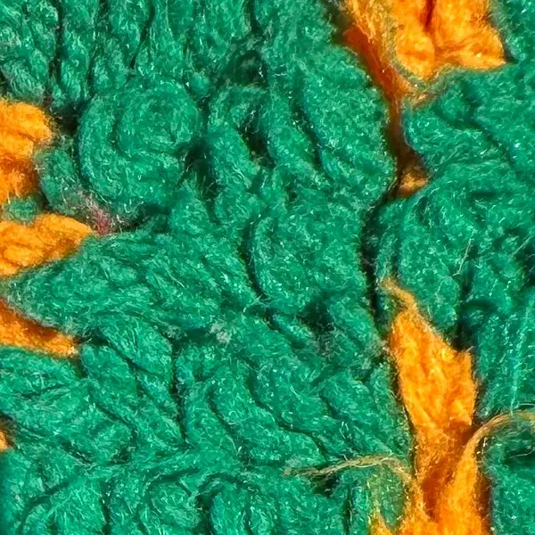 A medium green color swatch from the green family.