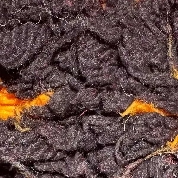 Dark brown color swatch from the Talsint red family.