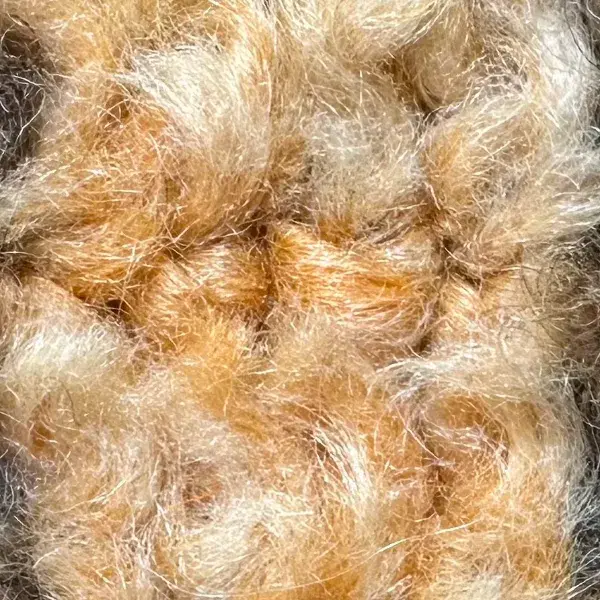 A light warm beige color swatch with hex code e0a56d from the orange family.